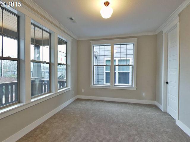 2437 North Alberta Street Portland, OR 97217 - Photo 10 of 16 an empty room with a window