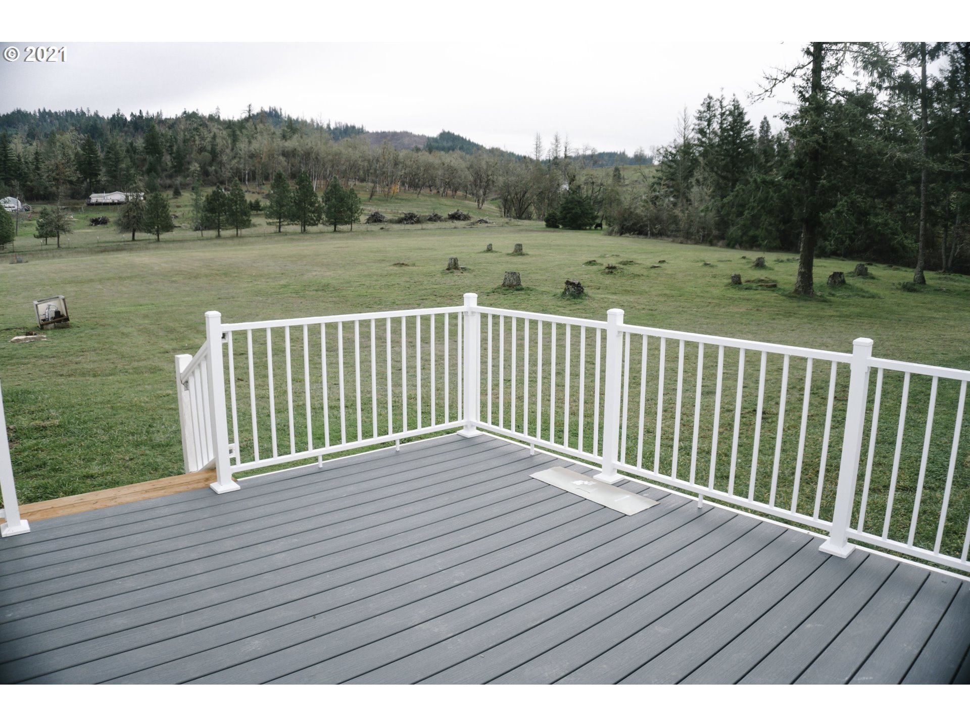 449 Fir Vista Road Sutherlin, OR 97479 - Photo 11 of 32 a view of a wooden deck