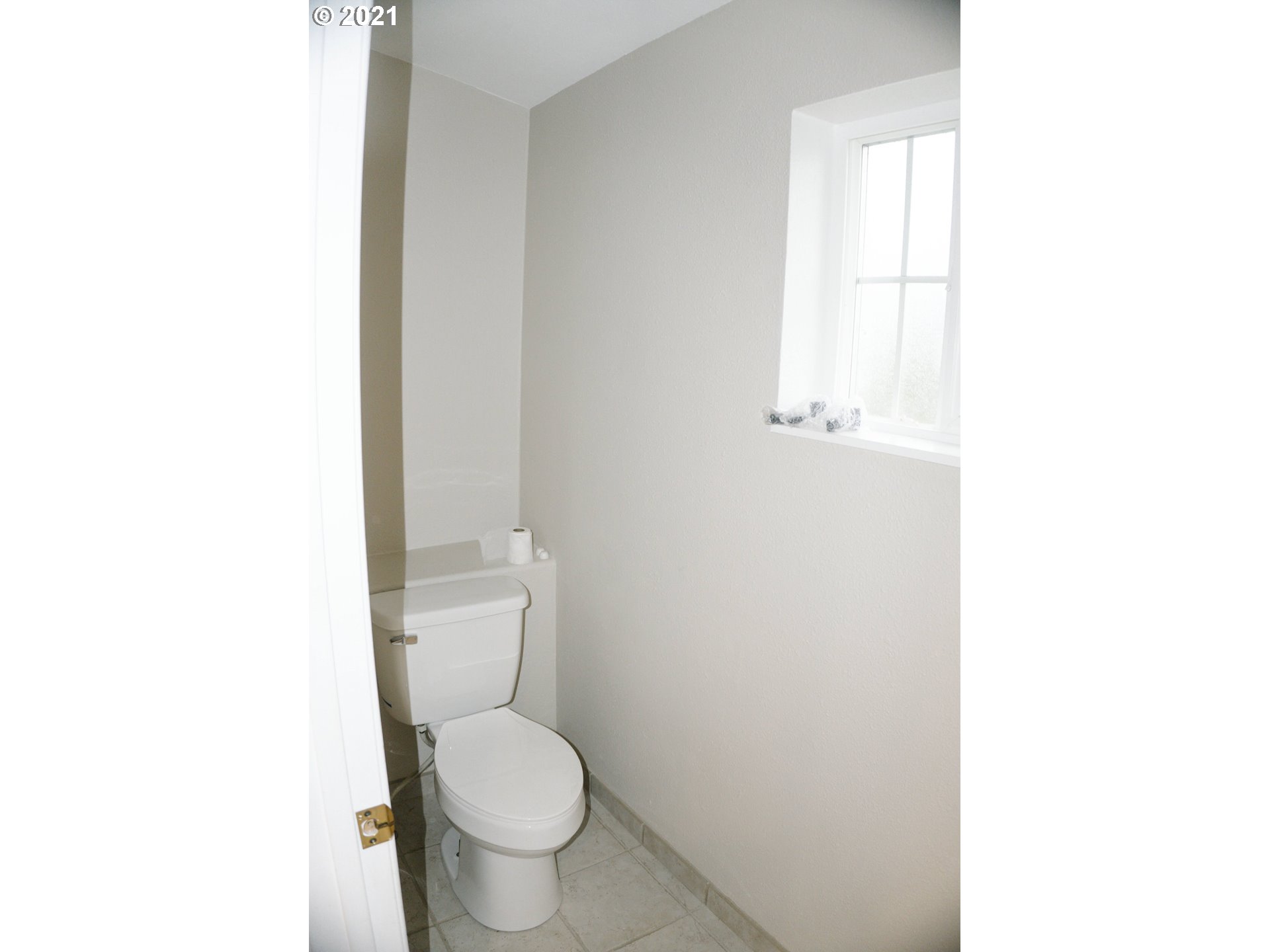 449 Fir Vista Road Sutherlin, OR 97479 - Photo 26 of 32 a white toilet sitting next to a white cabinet