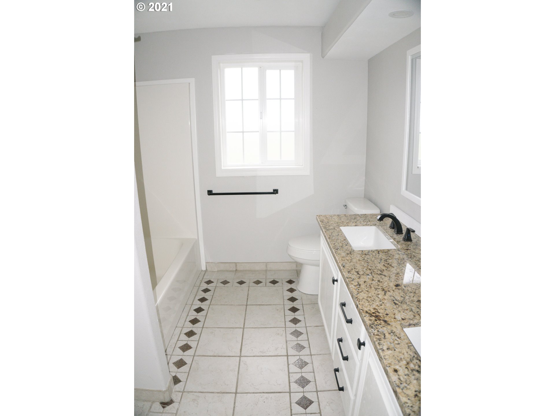 449 Fir Vista Road Sutherlin, OR 97479 - Photo 29 of 32 a bathroom with a granite countertop sink and a mirror