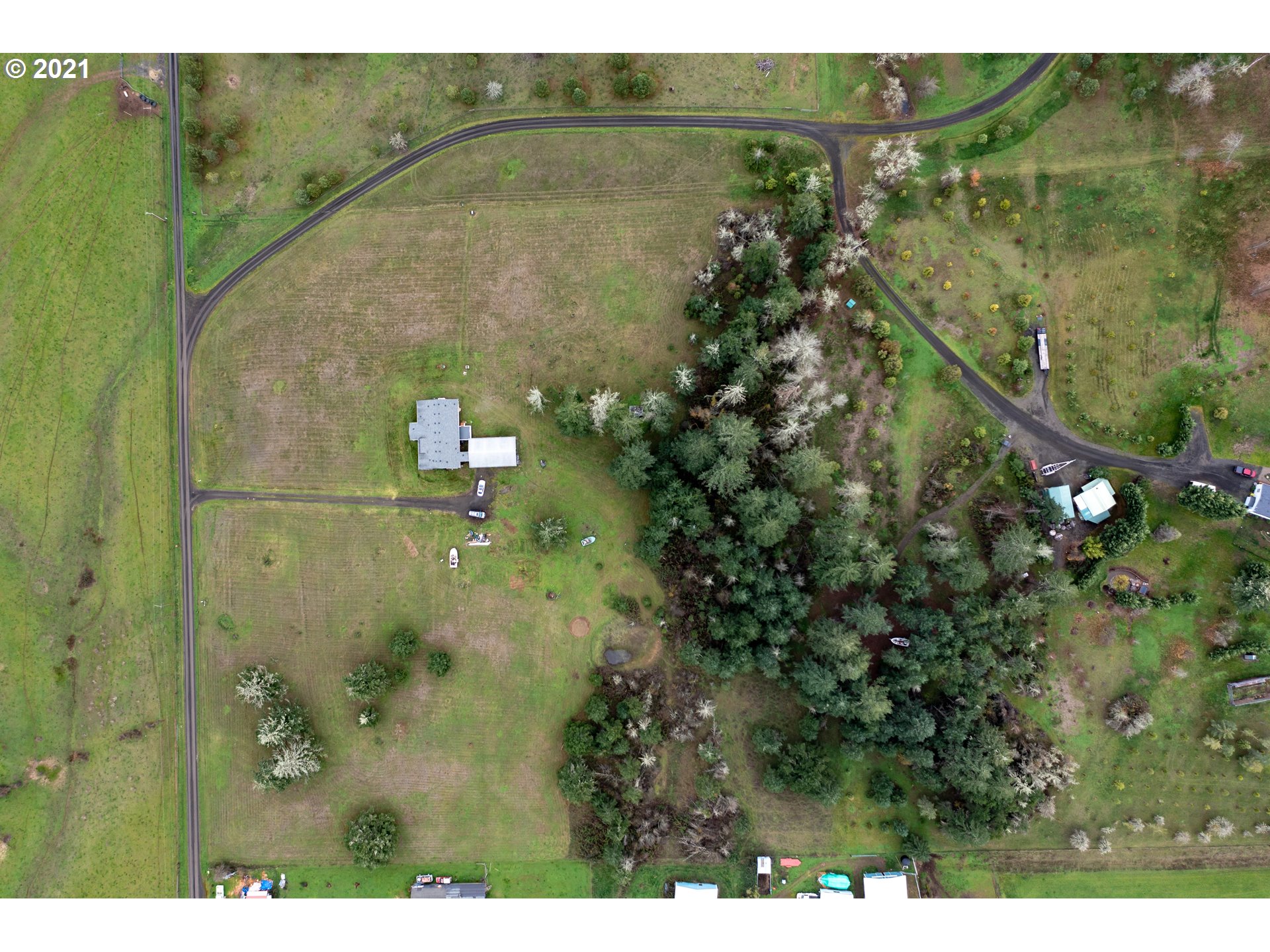 449 Fir Vista Road Sutherlin, OR 97479 - Photo 4 of 32 a aerial view of a house with a yard