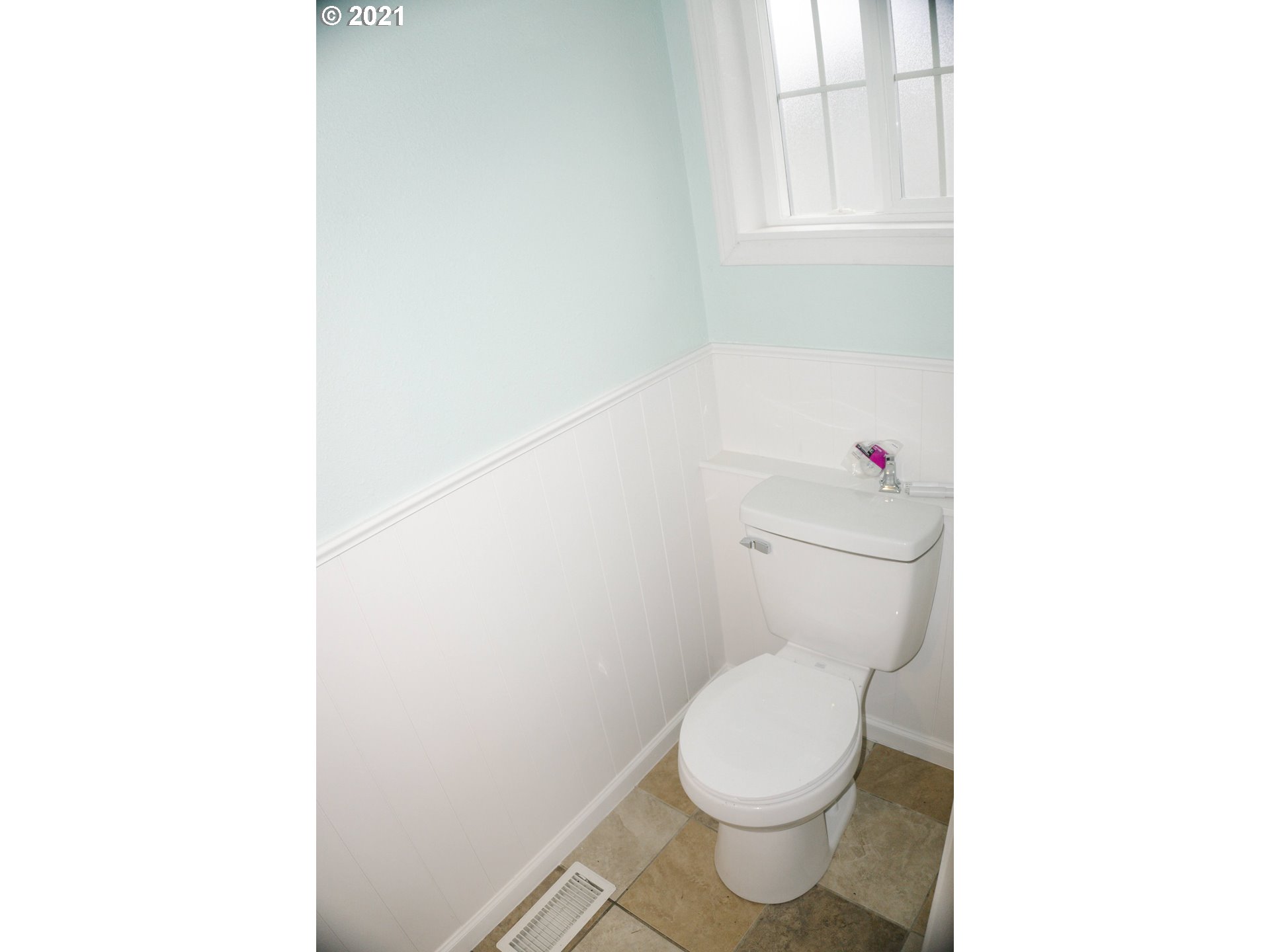 449 Fir Vista Road Sutherlin, OR 97479 - Photo 32 of 32 a white toilet sitting next to a window