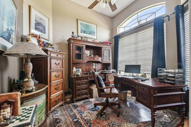 a view of a workspace with furniture