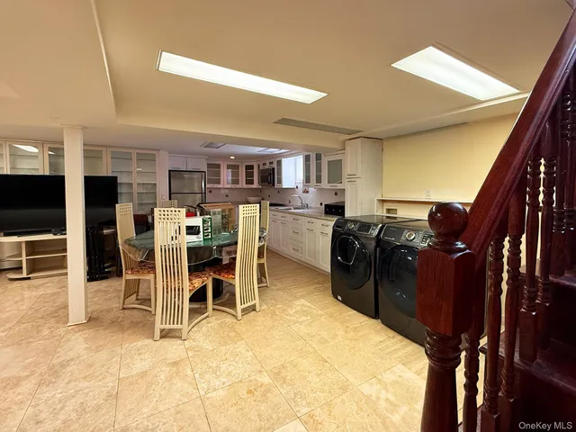 a kitchen with lots of counter top space and appliances