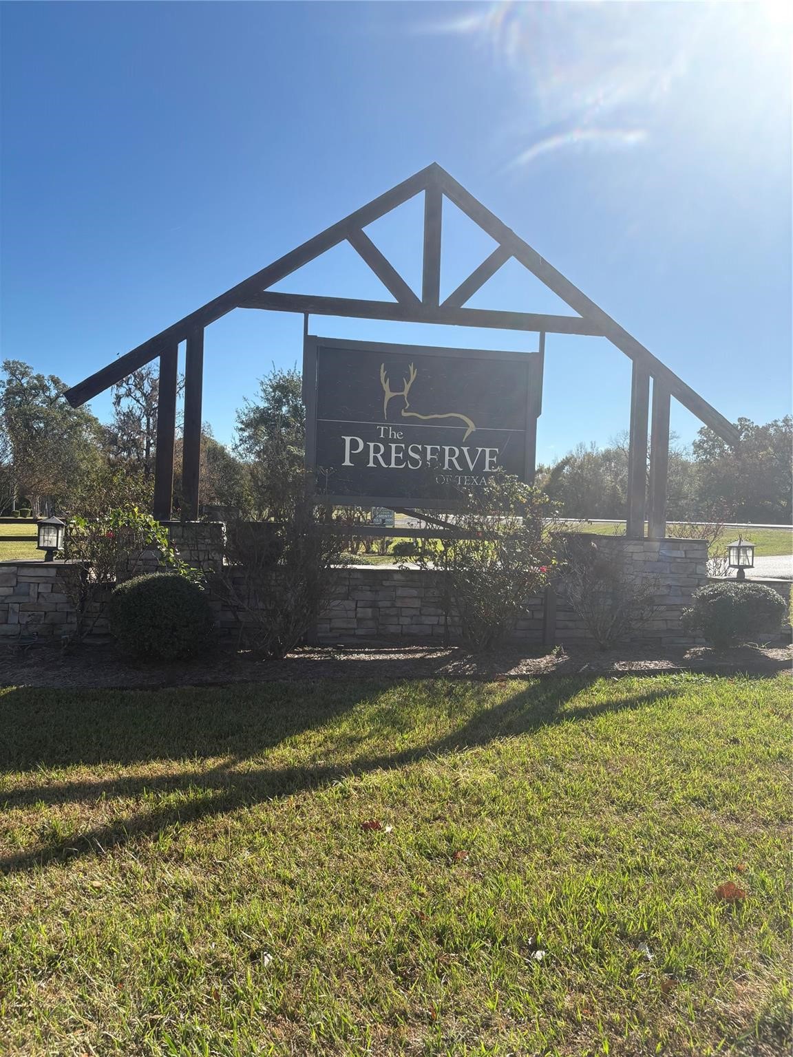 195 Center Street Cleveland, TX 77327 - Photo 2 of 7 a view of a pathway of a house with a yard