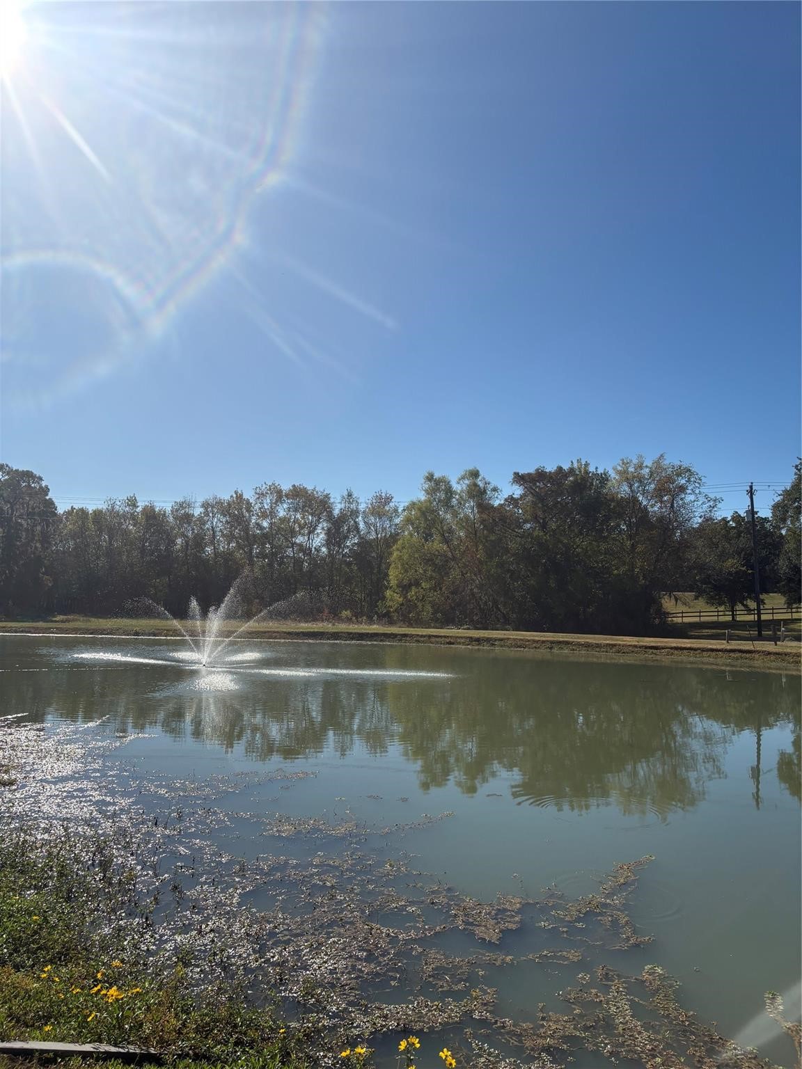 195 Center Street Cleveland, TX 77327 - Photo 4 of 7 a view of a lake with a city