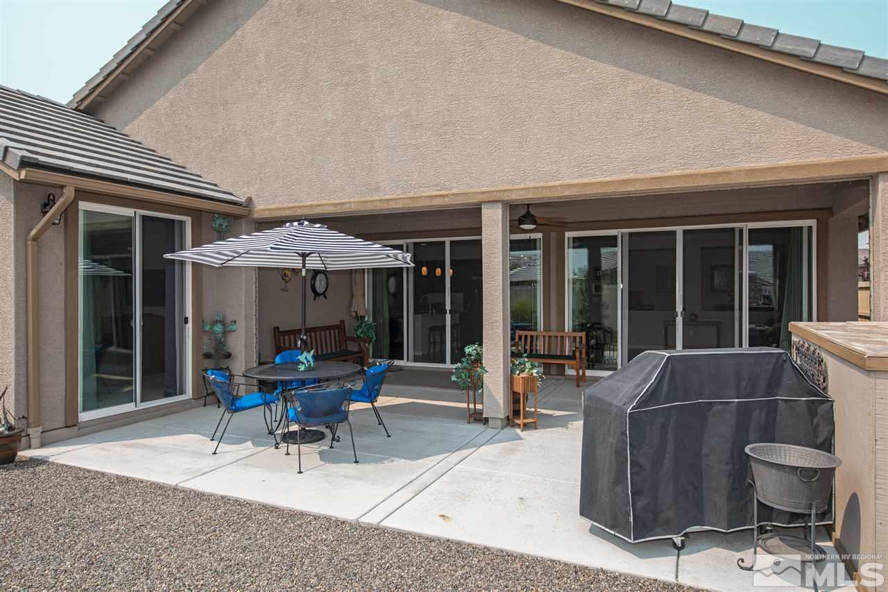 9850 Shadowless Trail Reno, NV 89521 - Photo 29 of 39 a view of a house with sitting area and furniture