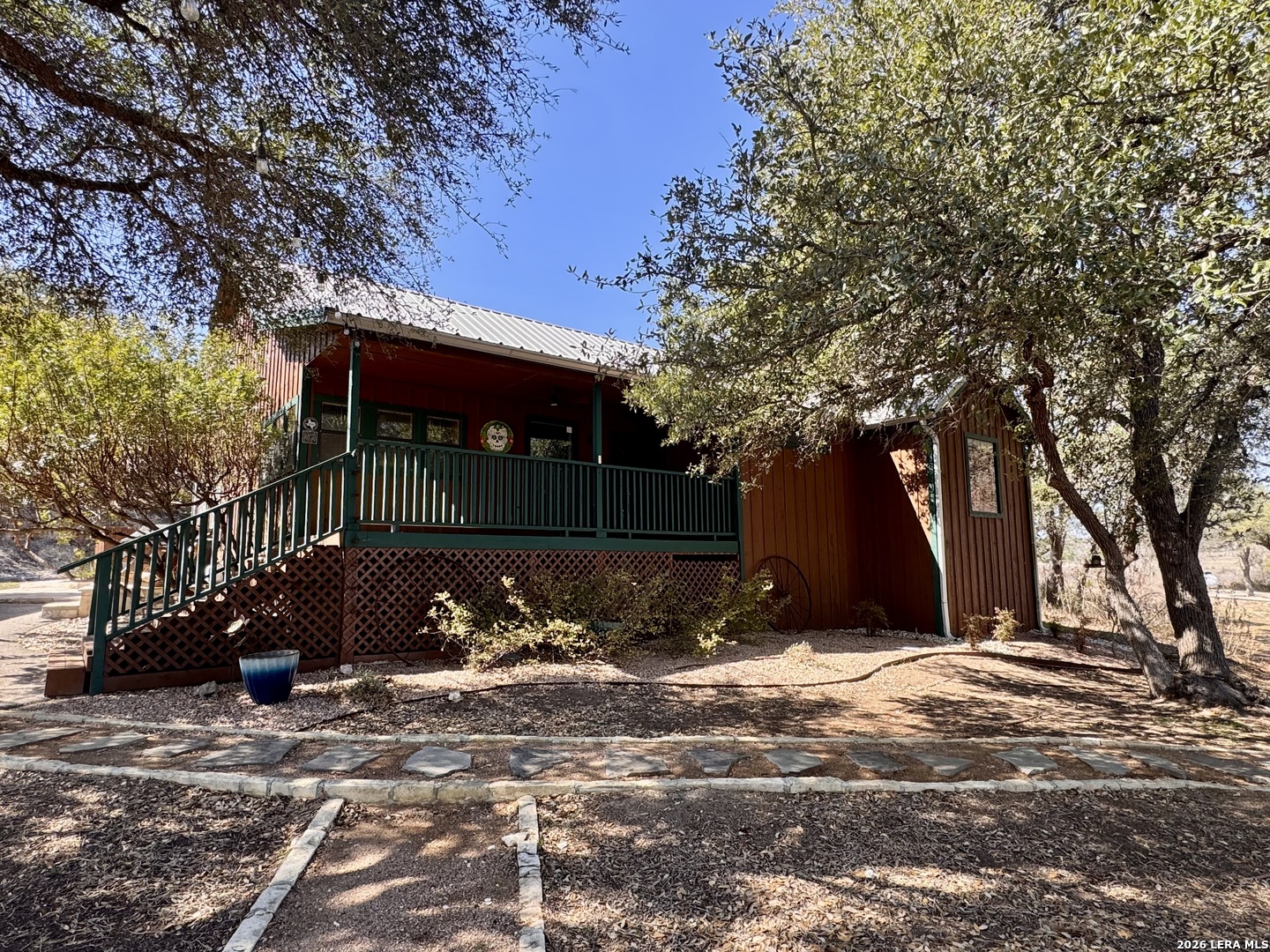 451 Wegener Trail Fischer, TX 78623 - Photo 4 of 43 a view of a house with a tree next to a yard