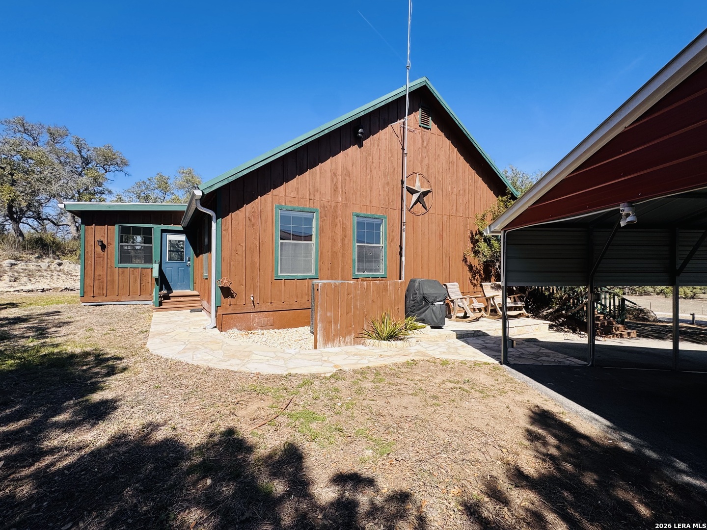 451 Wegener Trail Fischer, TX 78623 - Photo 6 of 43 a view of a house with a patio