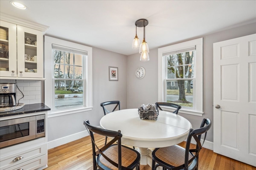 15 Hoover Road Hingham, MA 02043 - Photo 18 of 42 a view of a dining room with furniture window and wooden floor