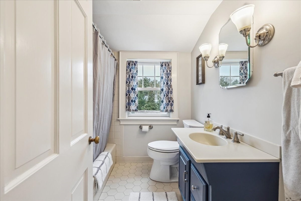 15 Hoover Road Hingham, MA 02043 - Photo 23 of 42 a bathroom with a sink and a mirror