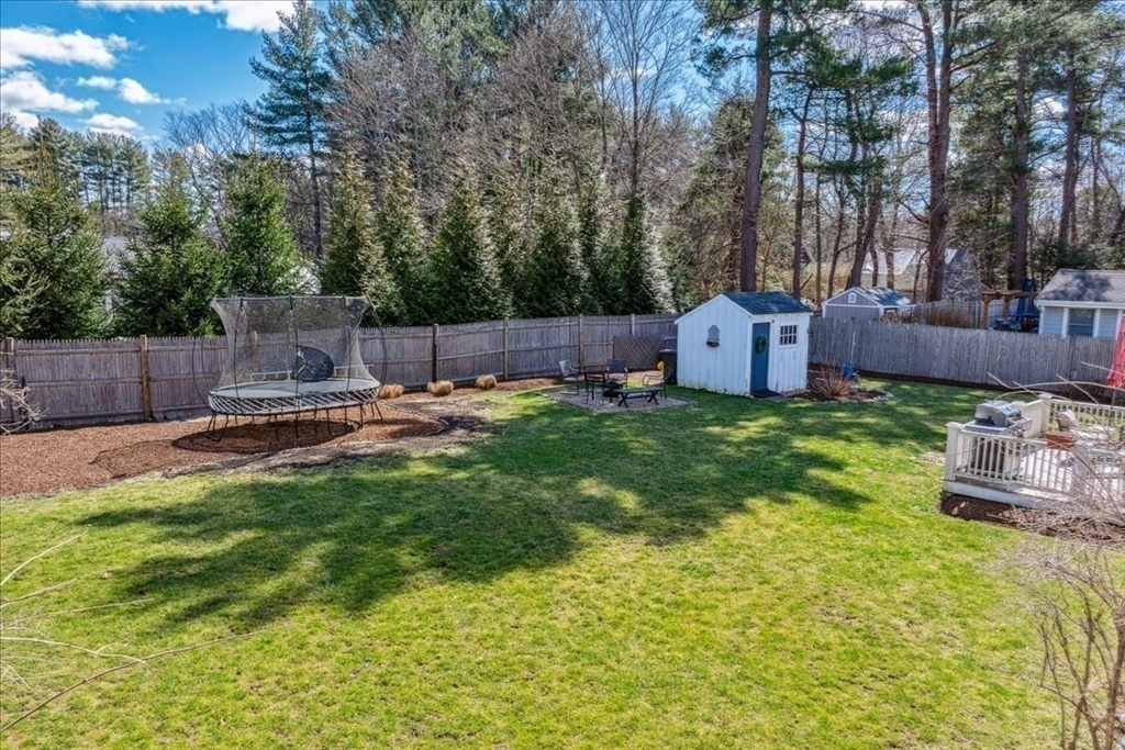 15 Hoover Road Hingham, MA 02043 - Photo 38 of 42 a view of a chair and table in the backyard