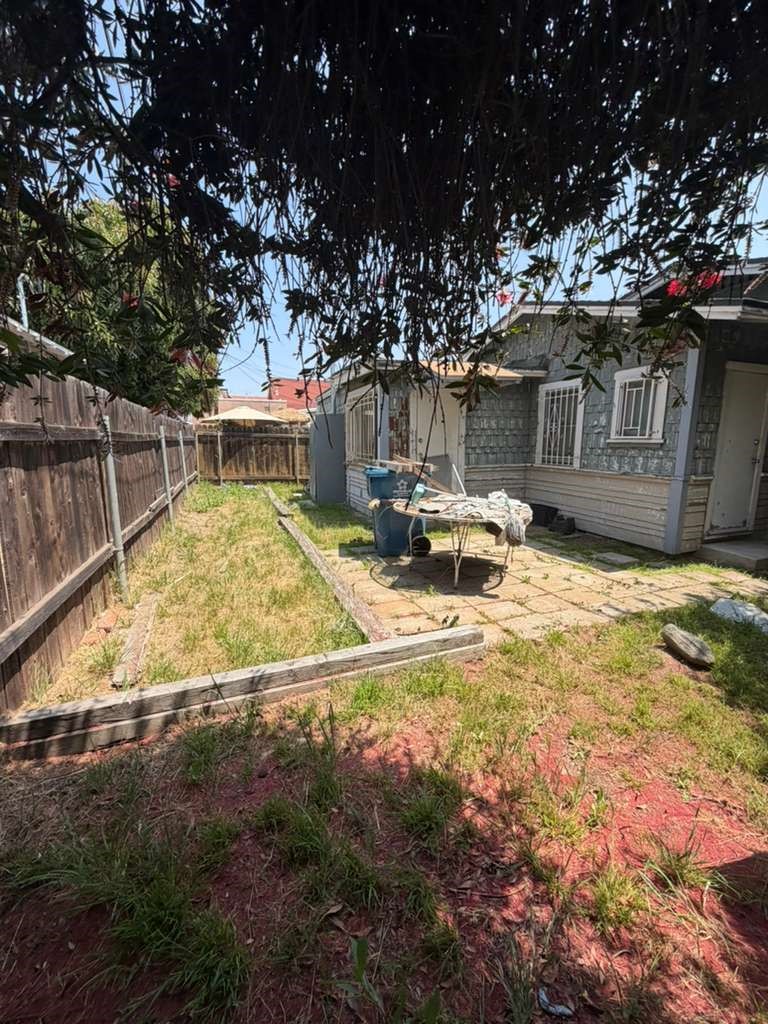 309 Alhambra Road Alhambra, CA 91801 - Photo 8 of 10 a swimming pool with outdoor seating and yard