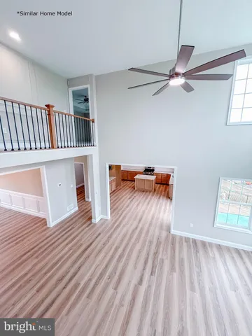 a view of livingroom with furniture and wooden floor