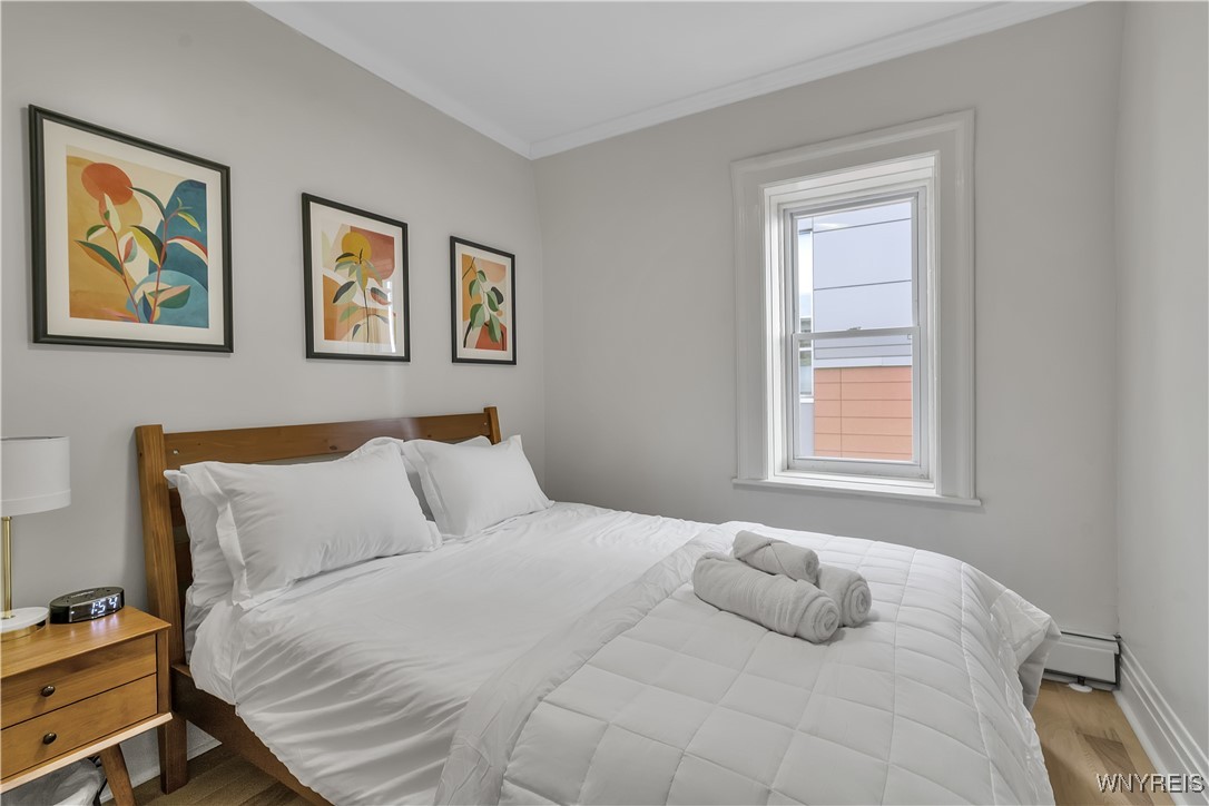 617 Niagara Street, Unit 5 Buffalo, NY 14201 - Photo 3 of 13 Cozy bedroom with queen size bed