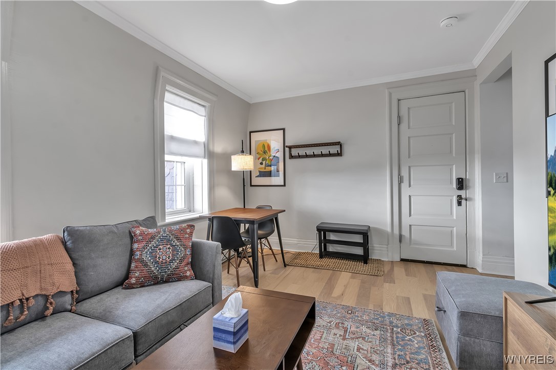 617 Niagara Street, Unit 5 Buffalo, NY 14201 - Photo 7 of 13 Modular sectional sofa pairs well with 65" Roku TV