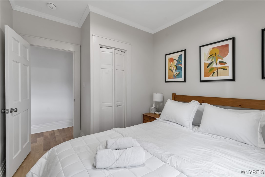 617 Niagara Street, Unit 5 Buffalo, NY 14201 - Photo 8 of 13 Cozy bedroom with queen size bed