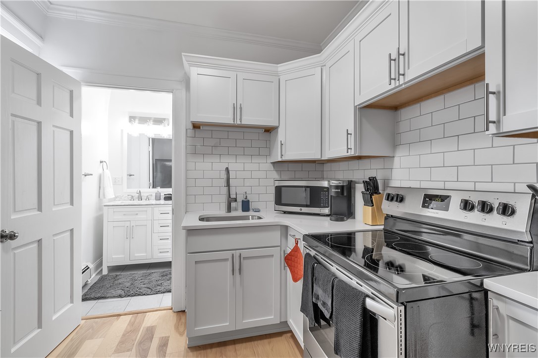 617 Niagara Street, Unit 5 Buffalo, NY 14201 - Photo 9 of 13 Full size stove and oven with just enough prep spa