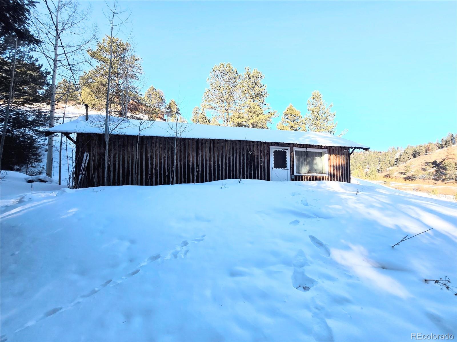 Foxton Road Conifer, CO 80433 - Photo 15 of 27 a view of a house with a outdoor space