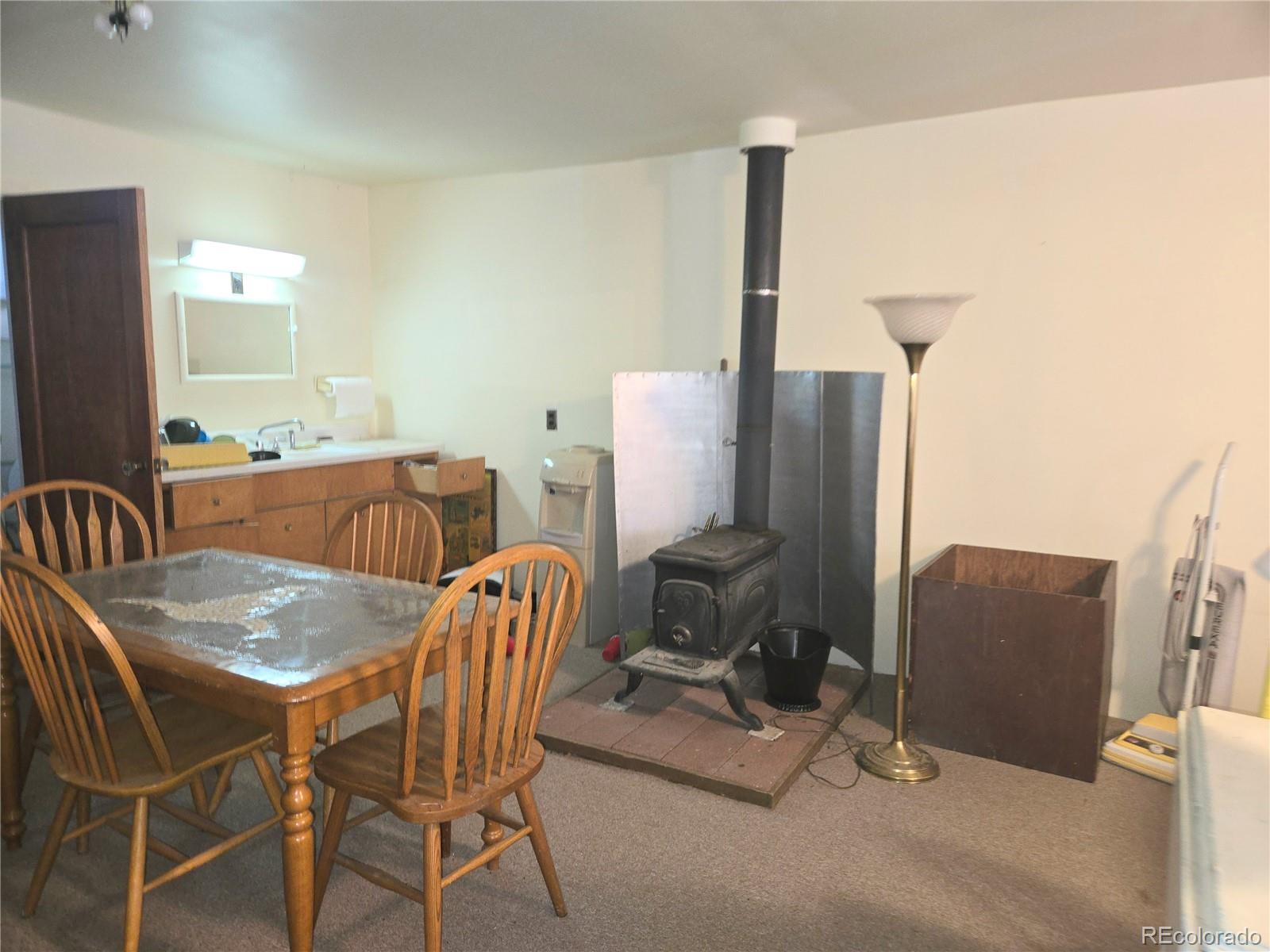 Foxton Road Conifer, CO 80433 - Photo 17 of 27 a view of a dining room with furniture