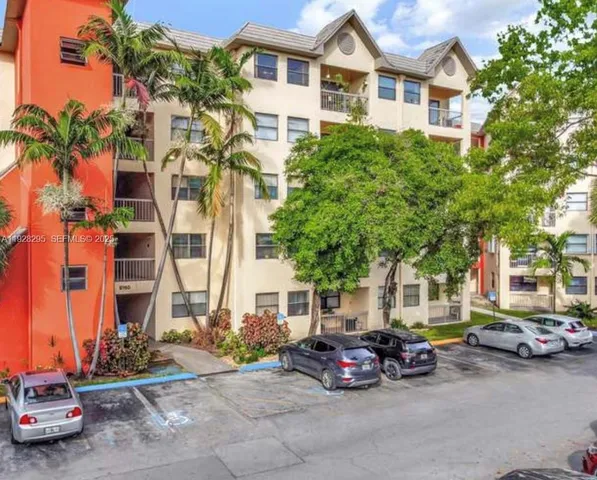 a view of a street with cars