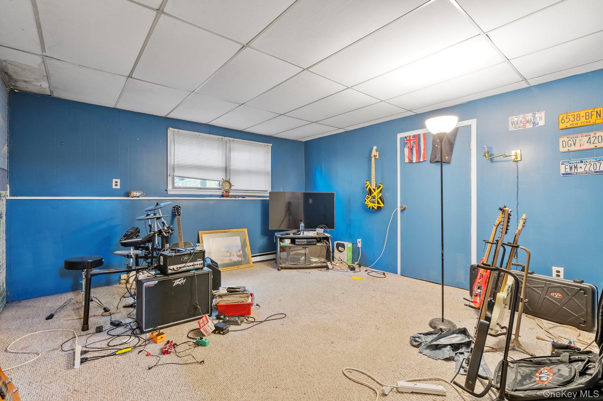 24 Russet Road Poughkeepsie, NY 12601 - Photo 24 of 26 a room with furniture and gym equipment