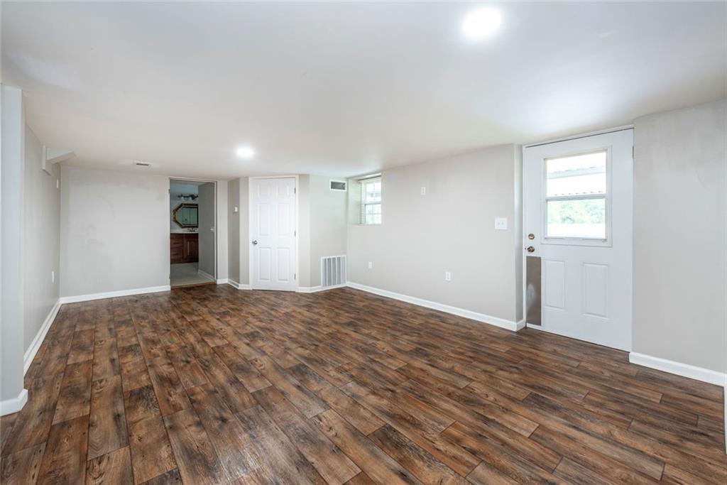 2508 Maple Road Southeast Rome, GA 30161 - Photo 23 of 55 a view of empty room with wooden floor