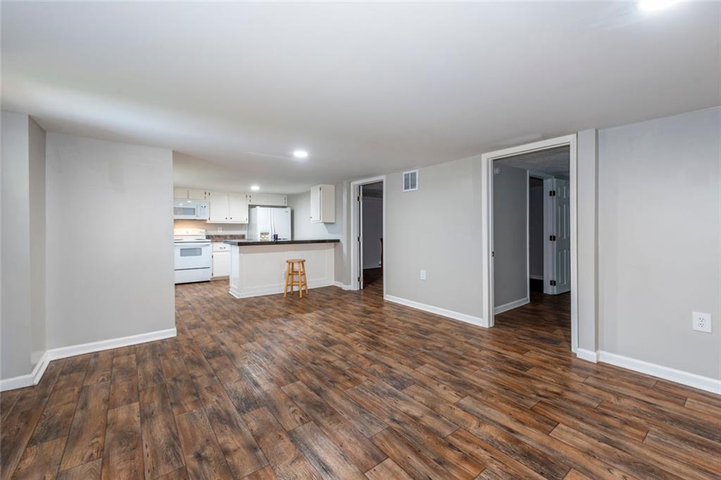 2508 Maple Road Southeast Rome, GA 30161 - Photo 32 of 55 a view of kitchen with wooden floor