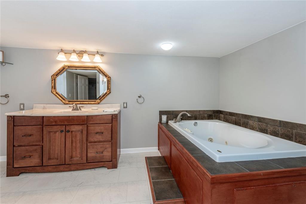 2508 Maple Road Southeast Rome, GA 30161 - Photo 38 of 55 a bathroom with a sink and a bathtub