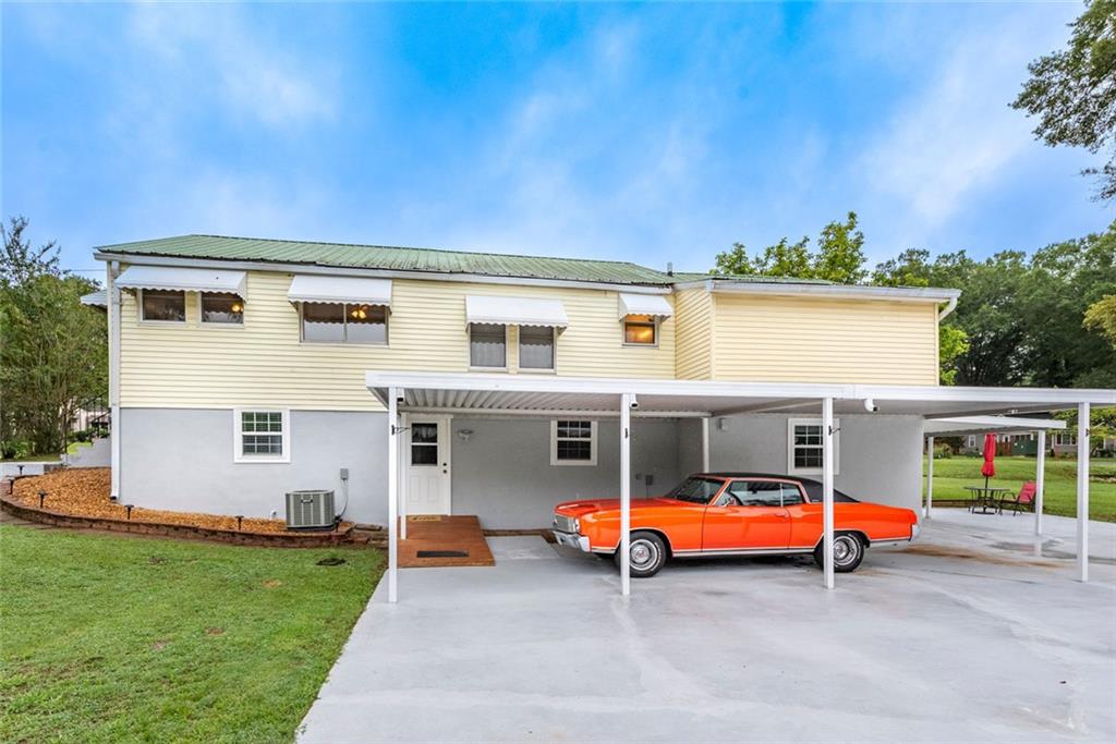 2508 Maple Road Southeast Rome, GA 30161 - Photo 40 of 55 a view of a house with a backyard