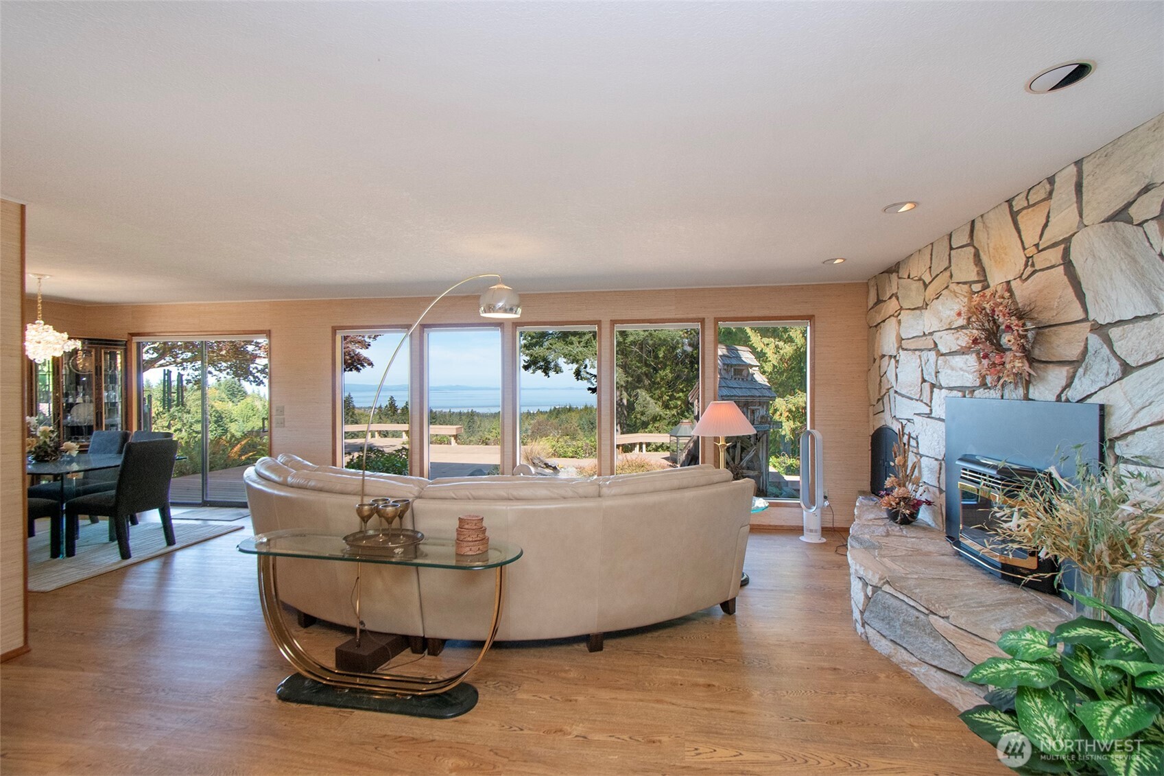 5418 South Old Mill Road Port Angeles, WA 98362 - Photo 11 of 39 a living room with furniture and a large window