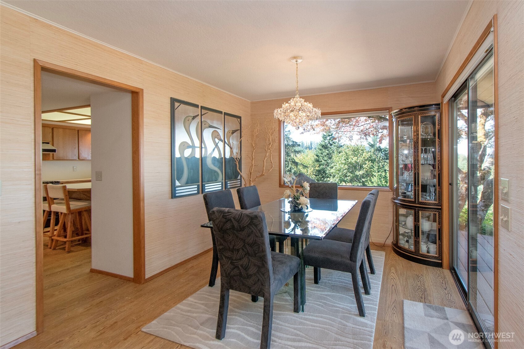 5418 South Old Mill Road Port Angeles, WA 98362 - Photo 13 of 39 a view of a dining room with furniture window and wooden floor