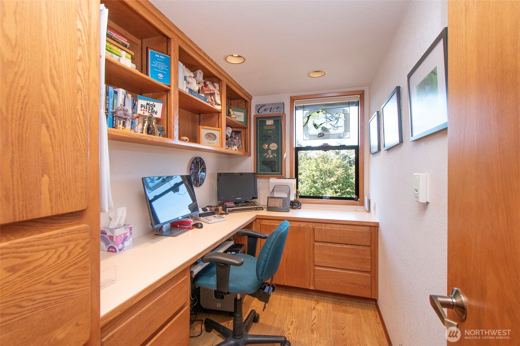 5418 South Old Mill Road Port Angeles, WA 98362 - Photo 17 of 39 a view of a workspace with furniture and a window