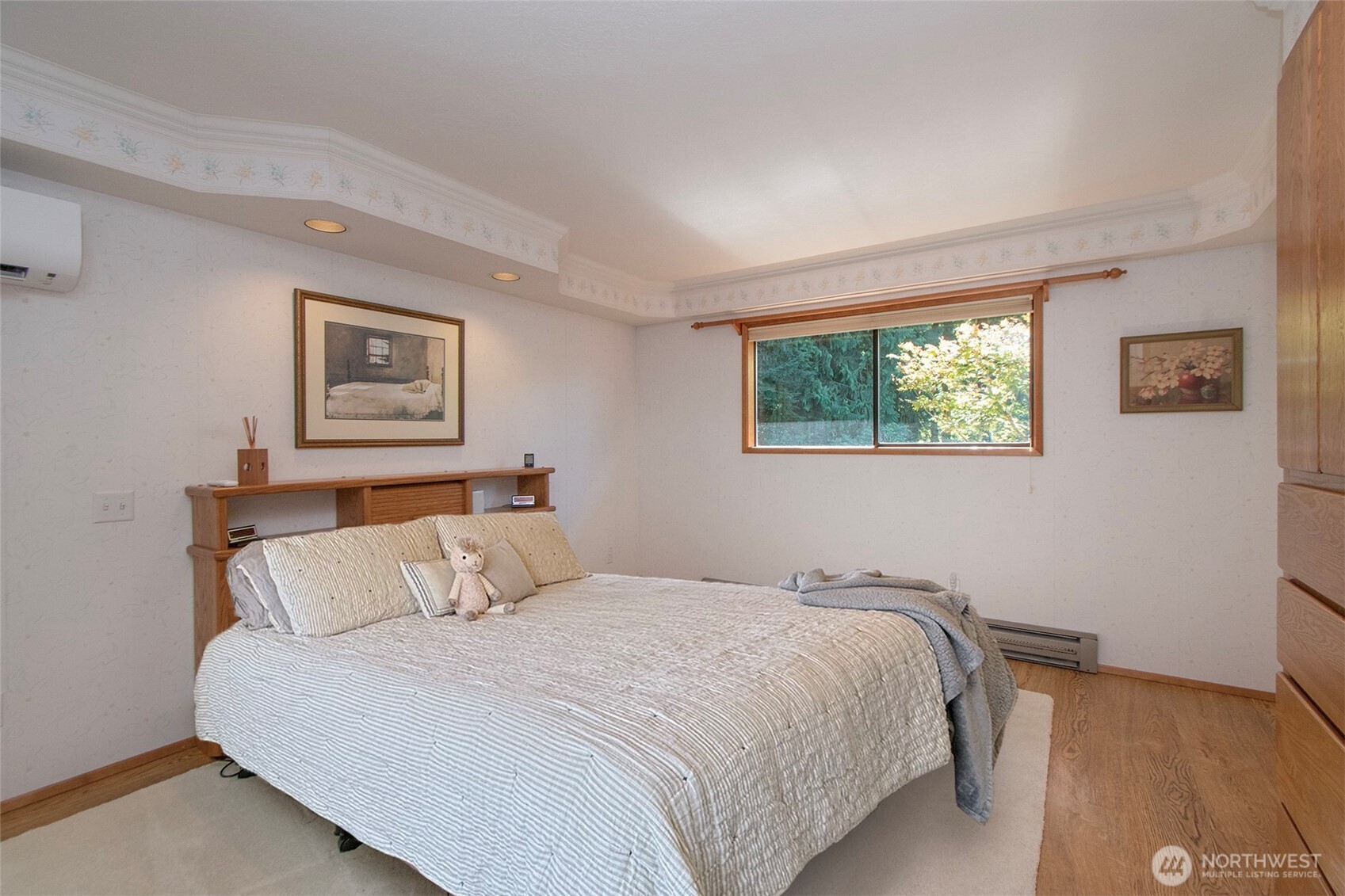 5418 South Old Mill Road Port Angeles, WA 98362 - Photo 20 of 39 a bedroom with a large bed and a window