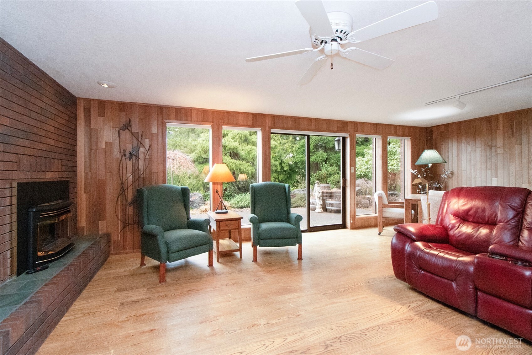 5418 South Old Mill Road Port Angeles, WA 98362 - Photo 26 of 39 a living room with furniture and a fireplace
