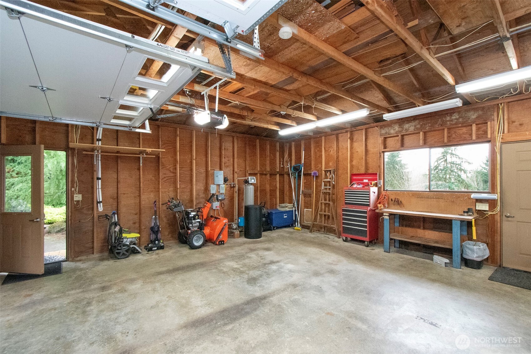 5418 South Old Mill Road Port Angeles, WA 98362 - Photo 29 of 39 a view of a garage with furniture