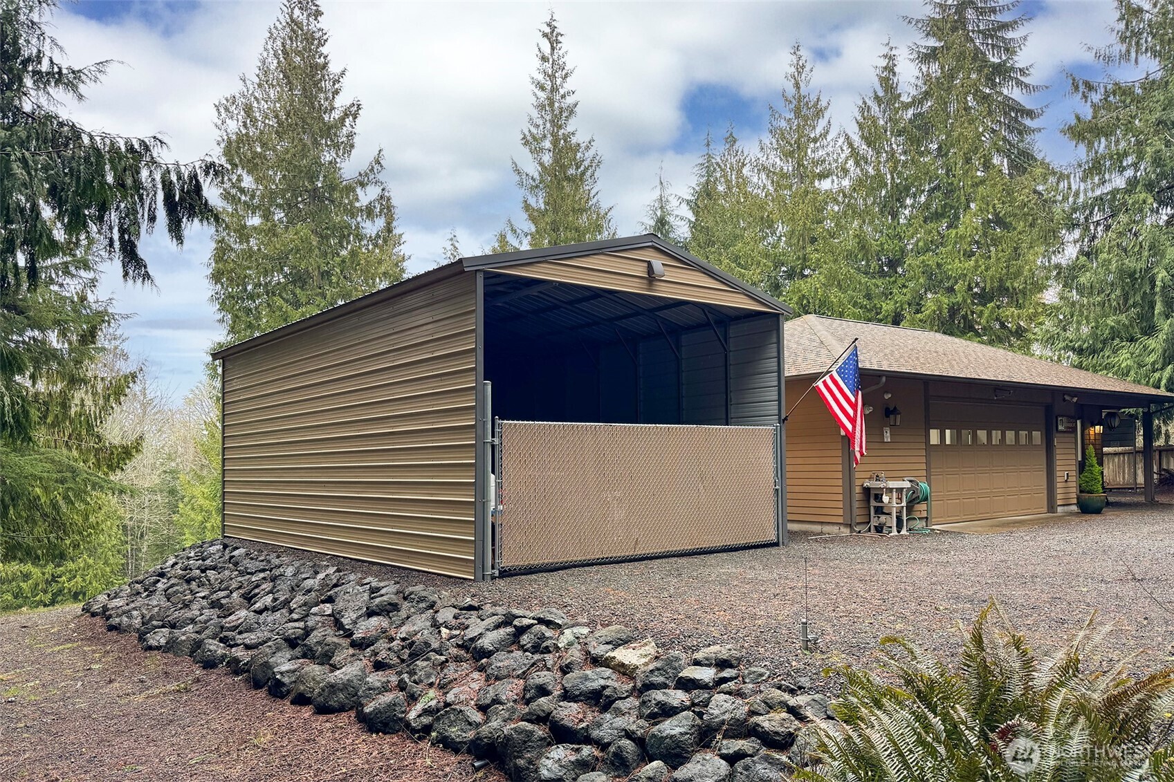 5418 South Old Mill Road Port Angeles, WA 98362 - Photo 30 of 39 a view of a house with a garage
