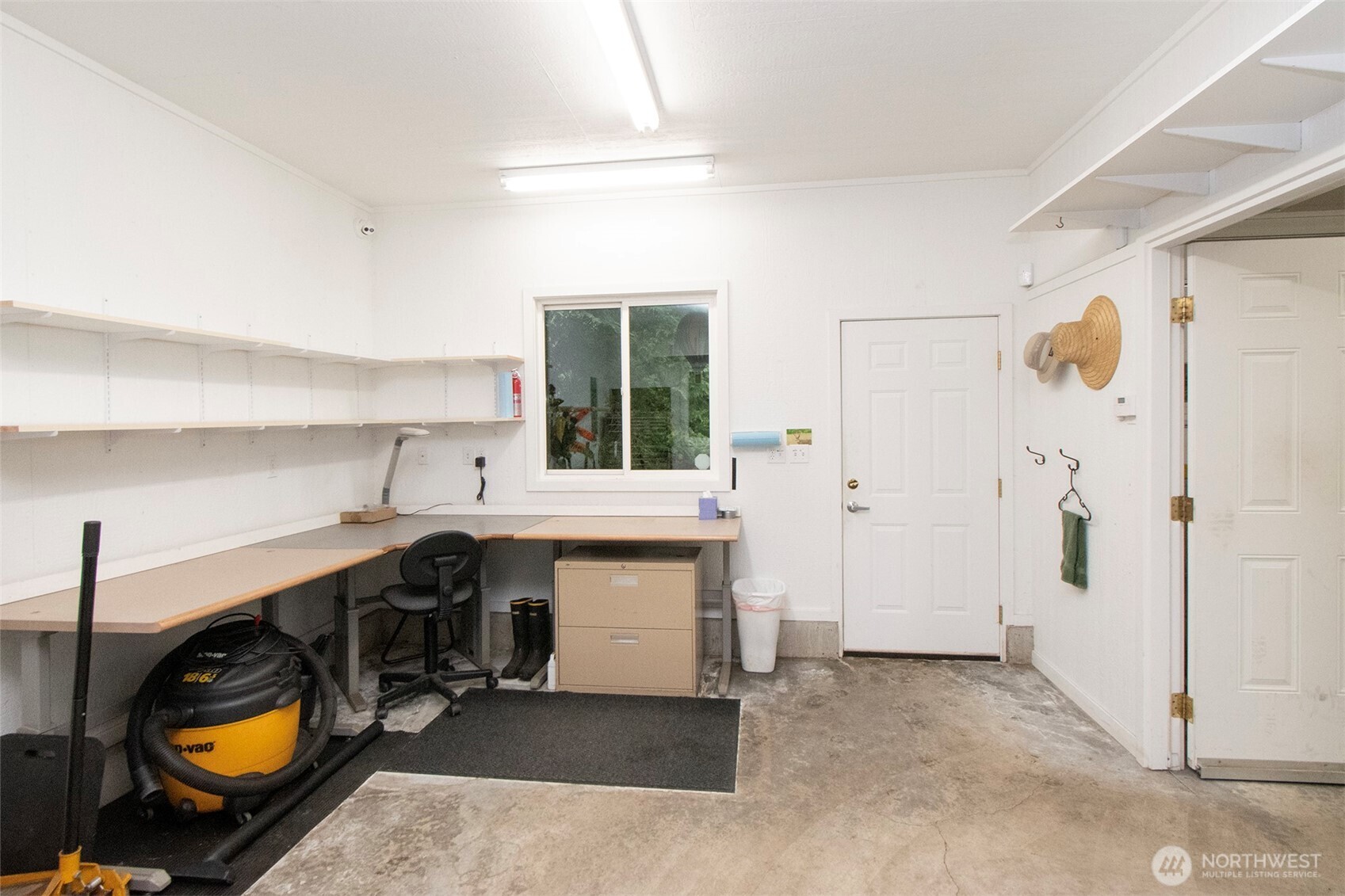 5418 South Old Mill Road Port Angeles, WA 98362 - Photo 32 of 39 a kitchen with a sink appliances and cabinets