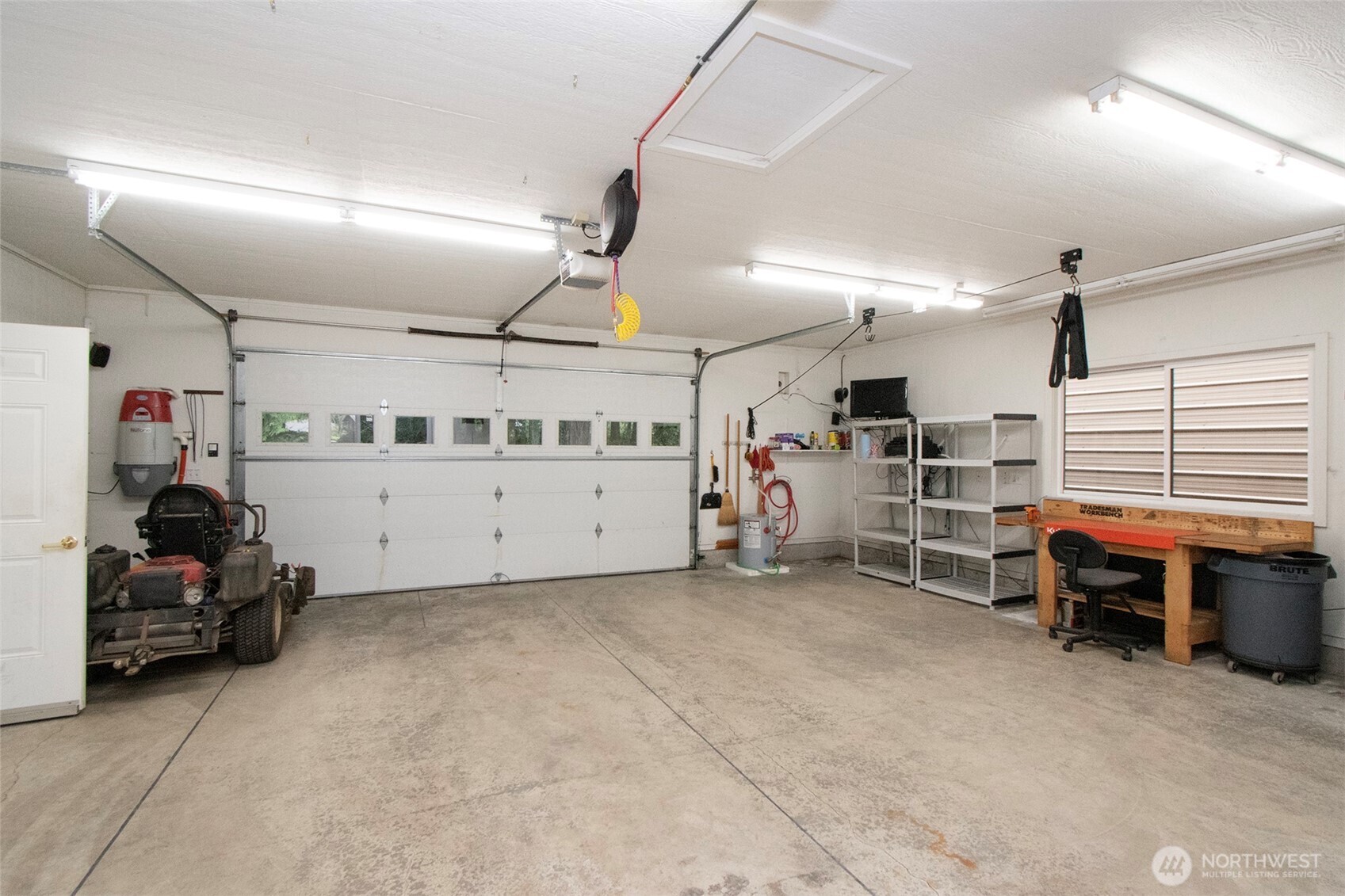5418 South Old Mill Road Port Angeles, WA 98362 - Photo 33 of 39 a view of a garage with furniture