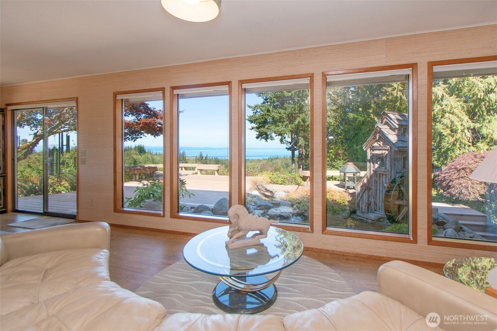 5418 South Old Mill Road Port Angeles, WA 98362 - Photo 8 of 39 a living room with furniture and a large window