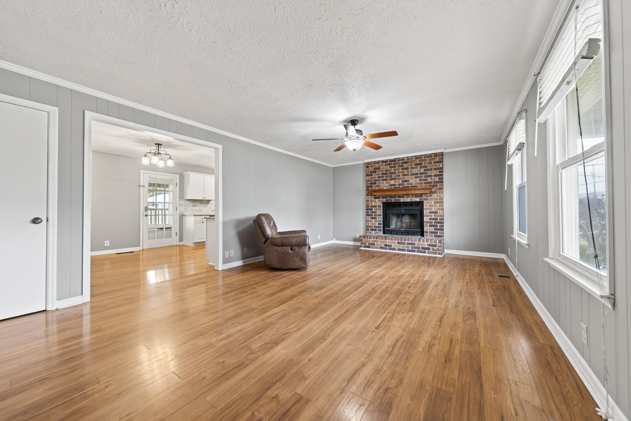 115 Calista Road White House, TN 37188 - Photo 20 of 38 a view of livingroom with furniture wooden floor fireplace and window
