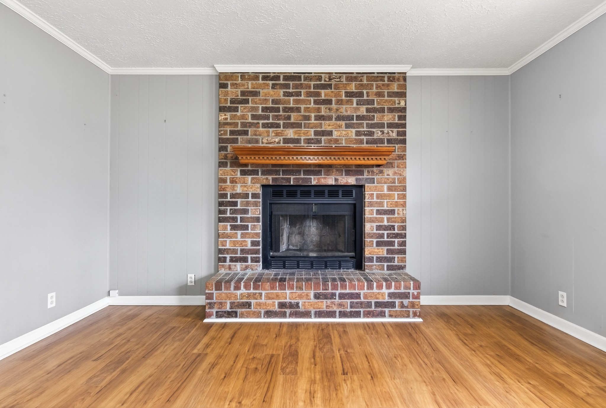 115 Calista Road White House, TN 37188 - Photo 21 of 38 a living room with a fireplace and a wooden floor