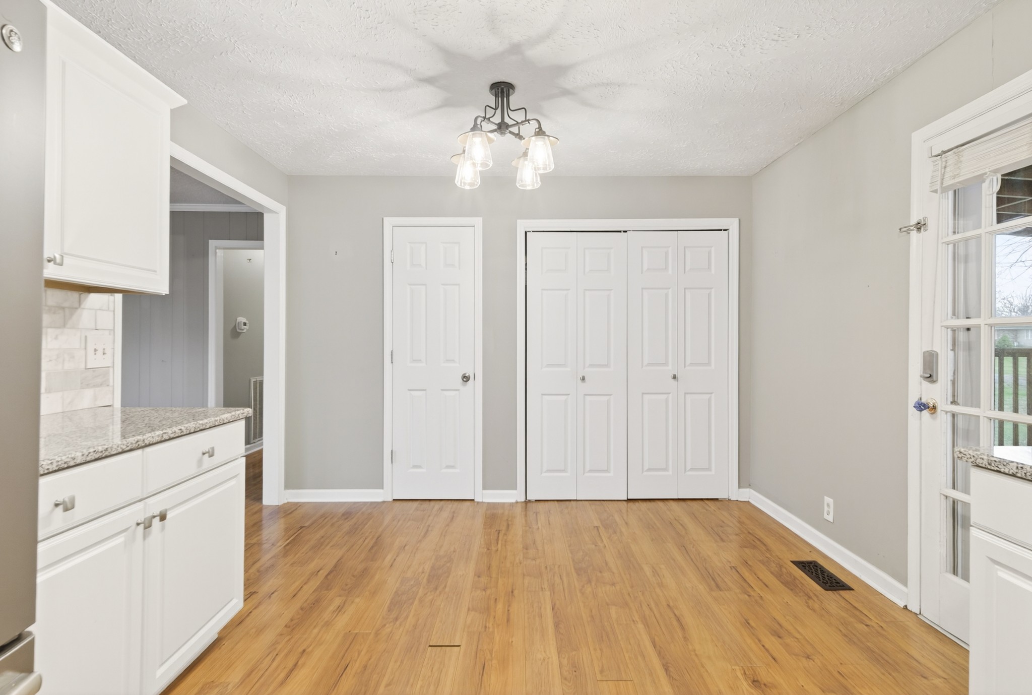115 Calista Road White House, TN 37188 - Photo 28 of 38 wooden floor in an empty room with a window