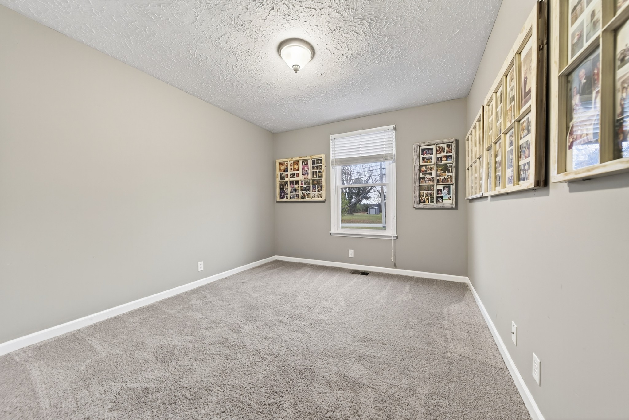 115 Calista Road White House, TN 37188 - Photo 32 of 38 an empty room with windows