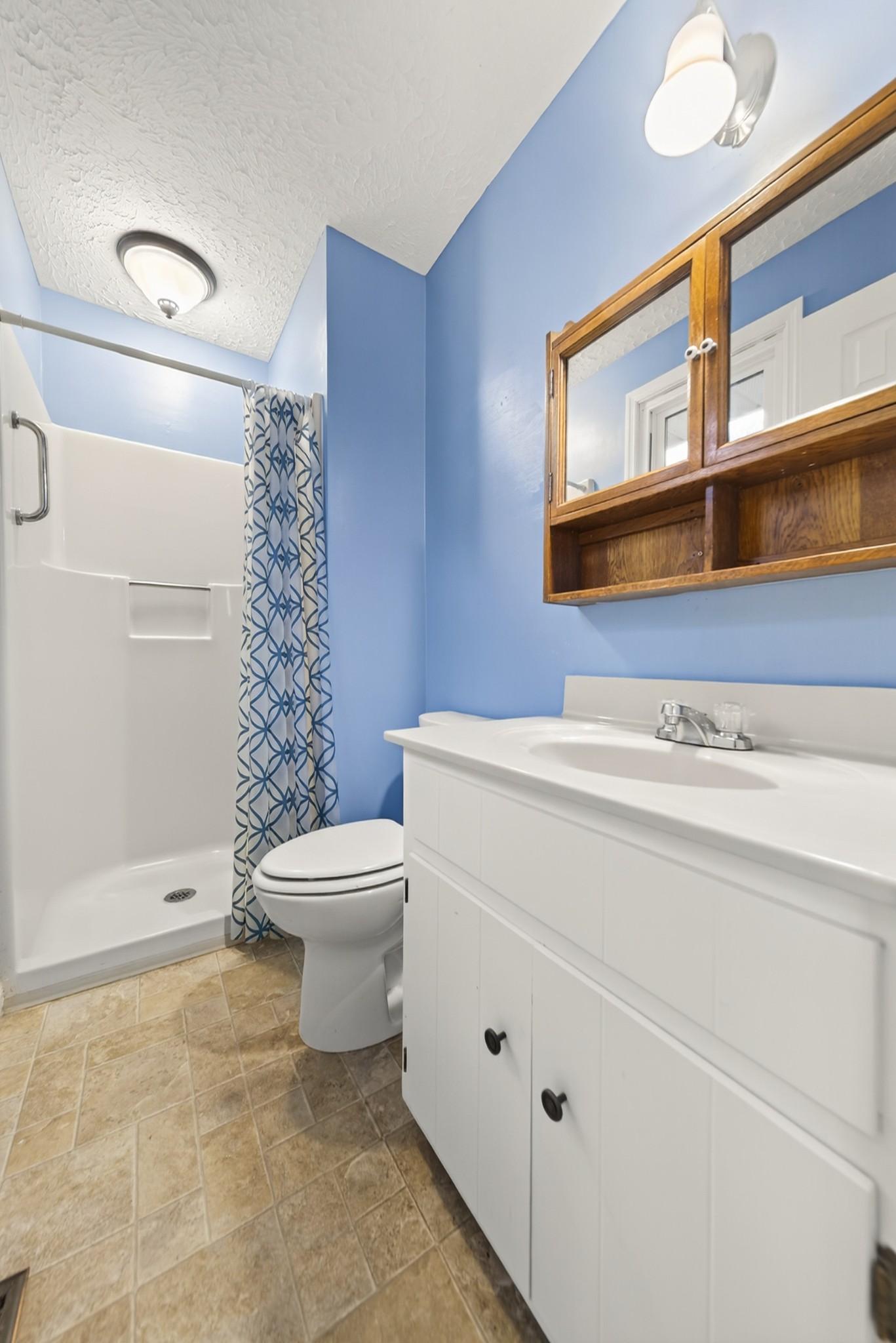 115 Calista Road White House, TN 37188 - Photo 35 of 38 a bathroom with a toilet a sink and mirror