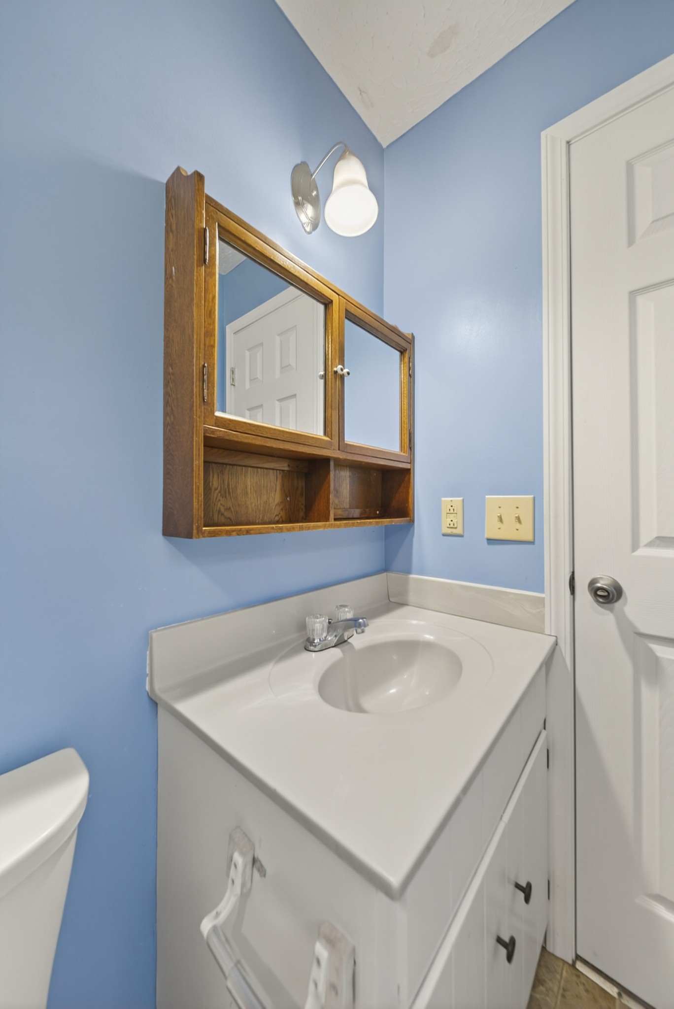 115 Calista Road White House, TN 37188 - Photo 36 of 38 a bathroom with a sink vanity and a mirror