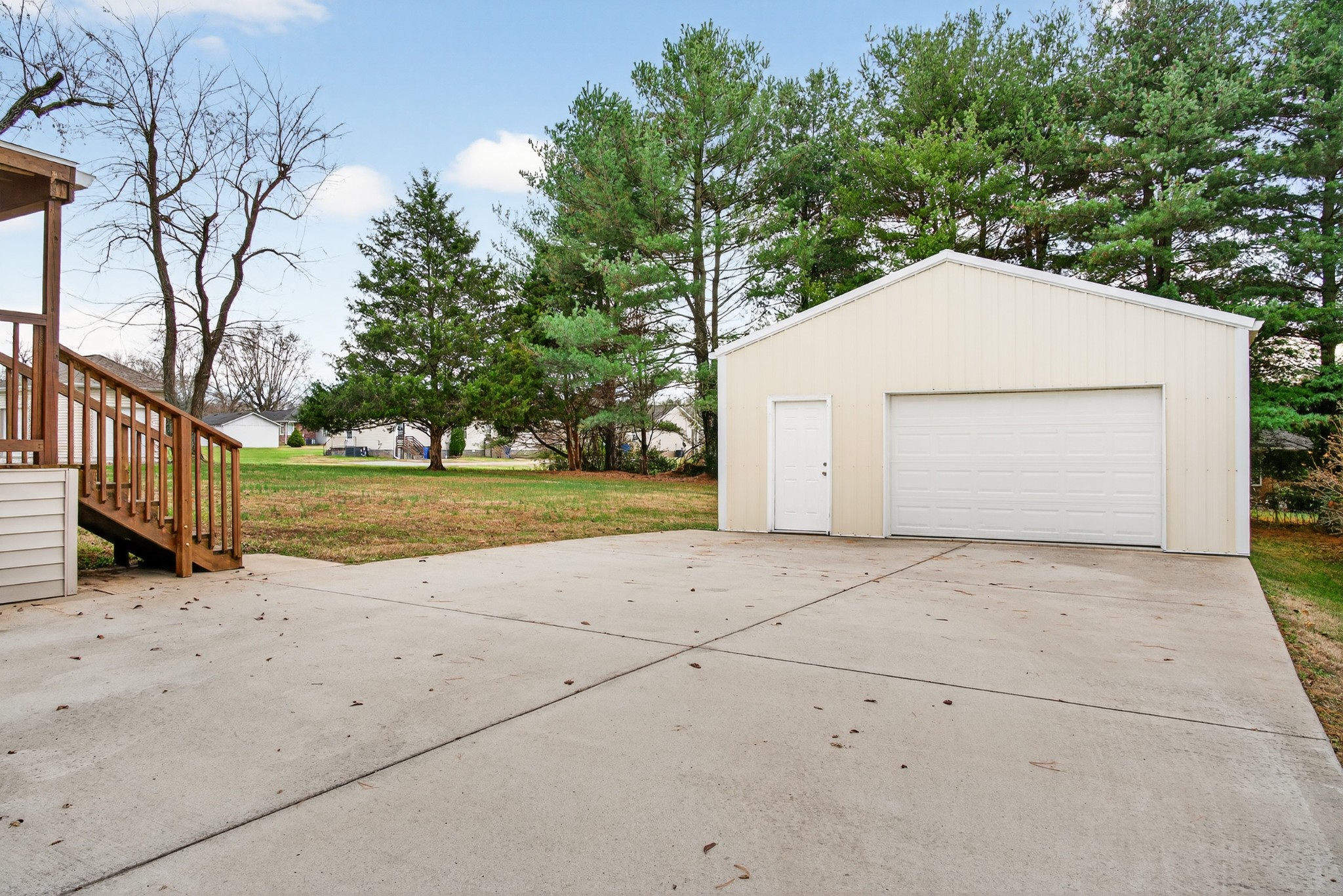115 Calista Road White House, TN 37188 - Photo 9 of 38 a view of a garage with a tree