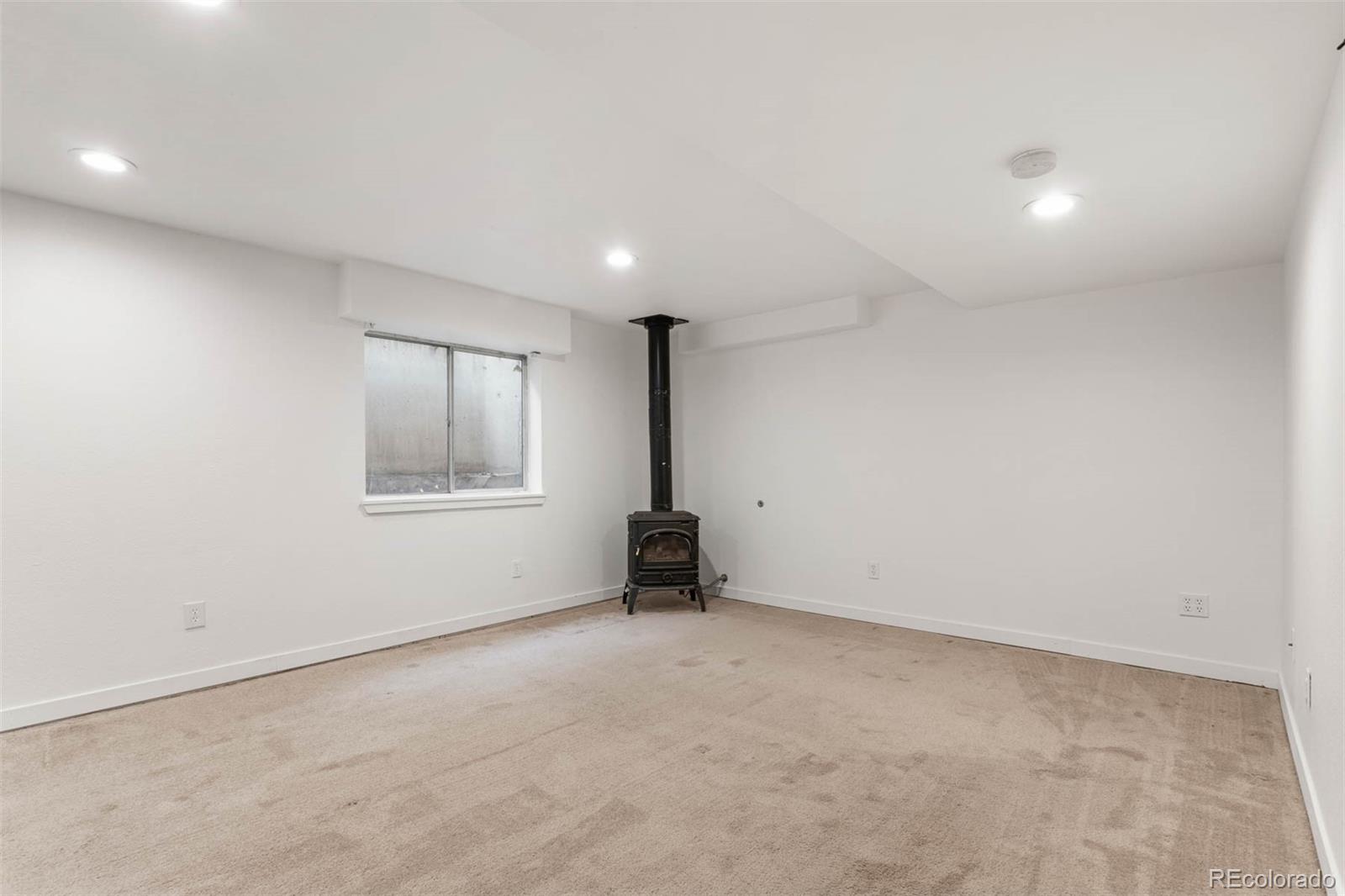 6283 Xavier Street Arvada, CO 80003 - Photo 25 of 36 an empty room with windows