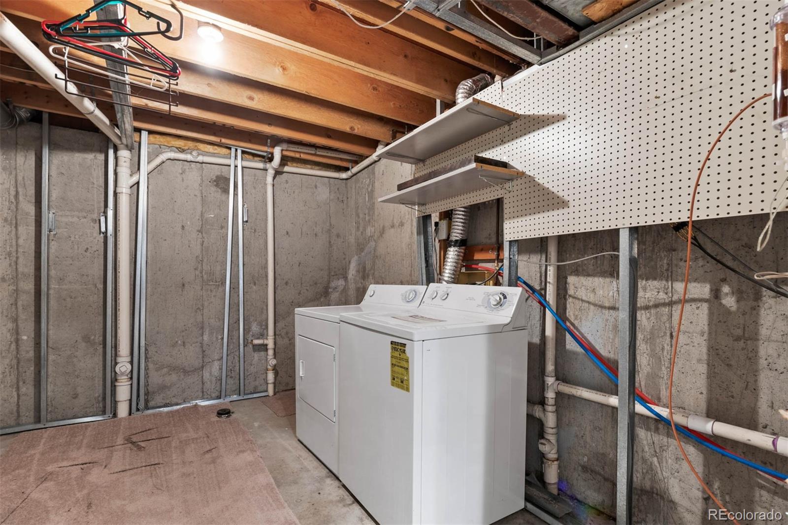 6283 Xavier Street Arvada, CO 80003 - Photo 30 of 36 a view of storage and utility room