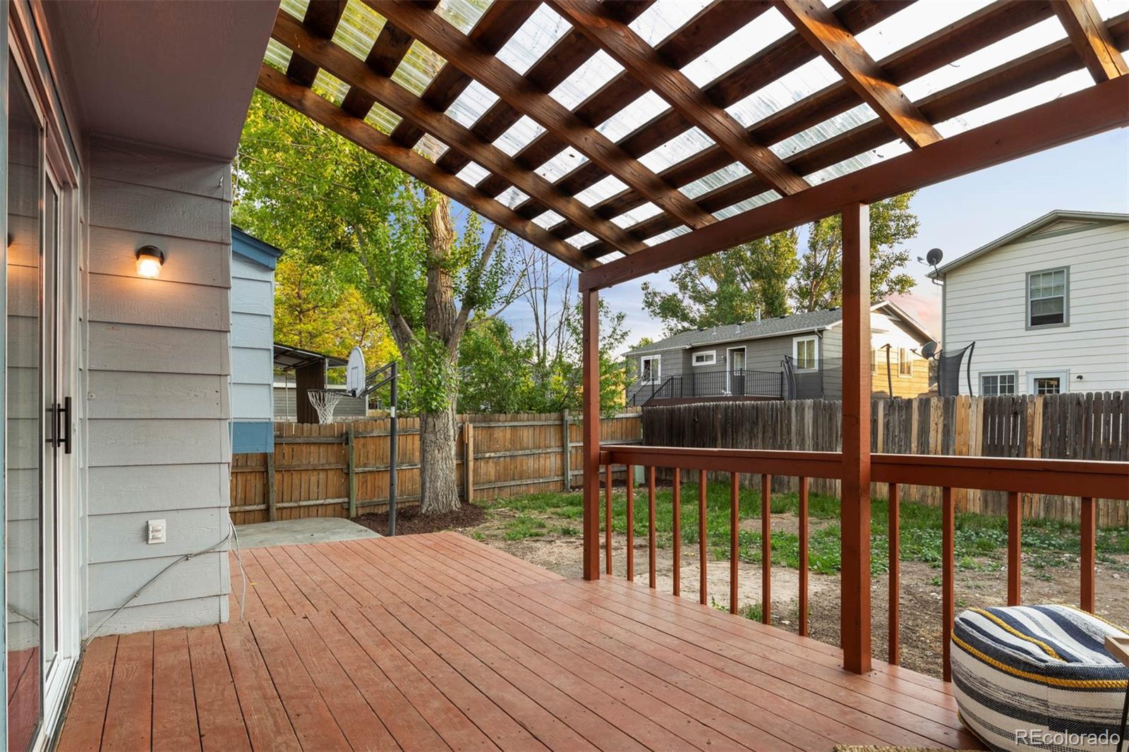 6283 Xavier Street Arvada, CO 80003 - Photo 32 of 36 a view of porch with a swing